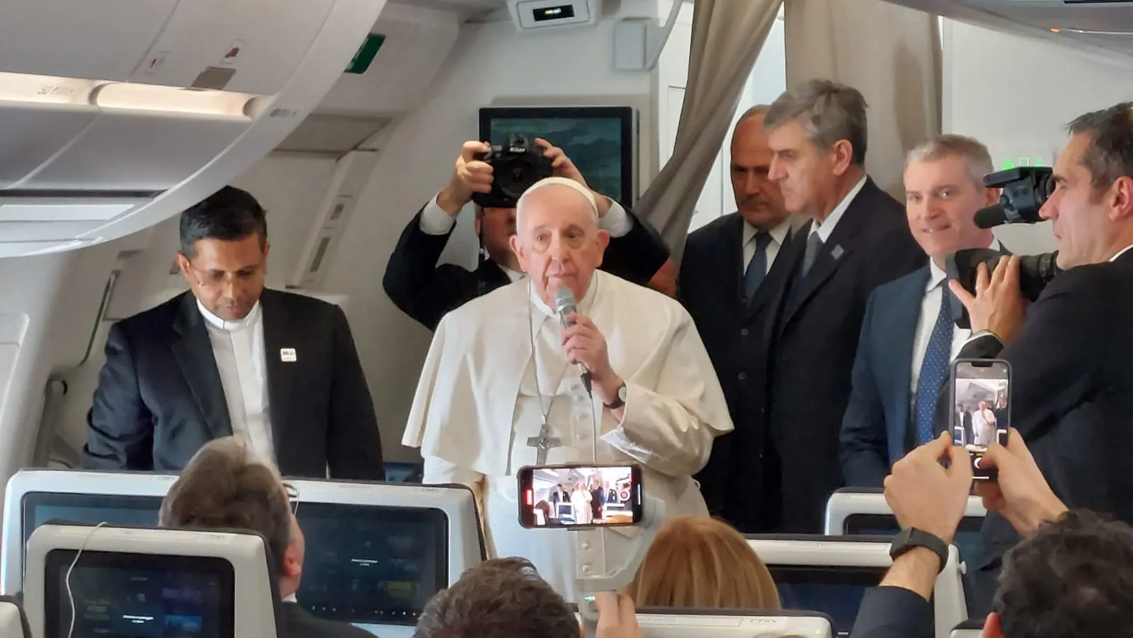 Pope Francis speaks to journalists on the flight to Kinshasa on Jan. 31, 2023. Elias Turk/EWTN