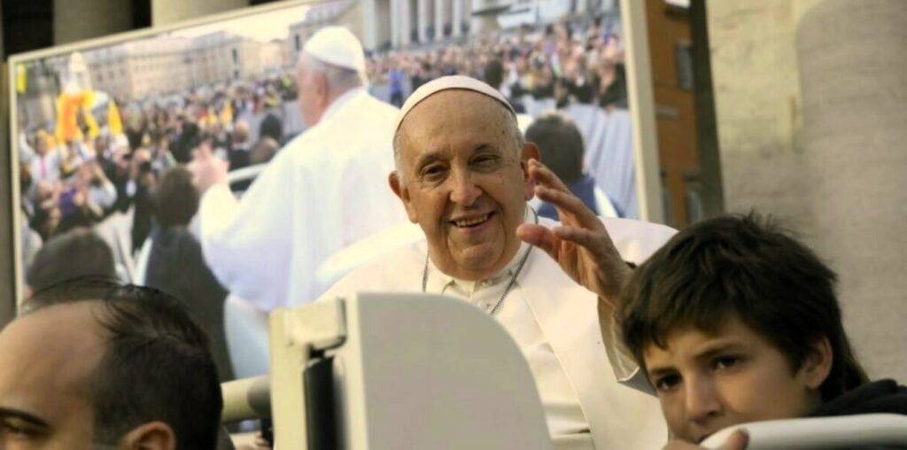 Pope Francis greets pilgrims in St. Peter's Square on Oct. 18. At the end of his general audience, the Pope said Oct. 27 will be a day of penance for the cause of peace in the world.
