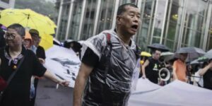 Jimmy Lai before his arrest, shown at a Hong Kong protest. Dominic Lee Tsz-king, a legislative council member from the pro-Beijing New People’s Party, has criticized a joint petition calling for Lai’s released. It was signed by 10 Catholic bishops, including Vancouver’s Archbishop Miller. (Acton Institute photo)