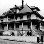 The Bilodeau home at 219 Carnarvon St., with Ellen Bilodeau and children. (Steve Norman Collection)