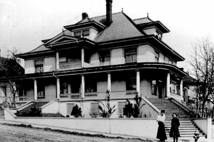 The Bilodeau home at 219 Carnarvon St., with Ellen Bilodeau and children. (Steve Norman Collection)