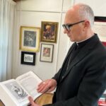 Bishop Joseph reflecting with the Holy Bible given to him by Mr. Harvey Satewas Gabriel (Photo courtesy Diocese of Charlottetown)