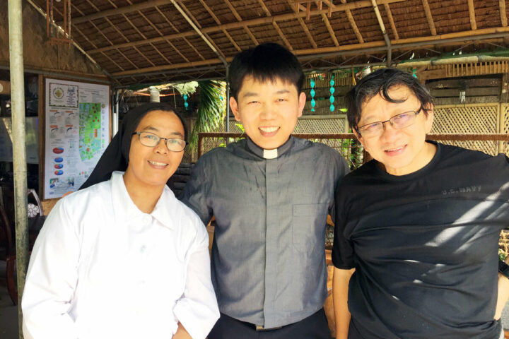 Father Paul Goo, centre, is pictured during a missions trip to the Philippines in 2017, will serve in the Vatican's Secretariat of State beginning in January. Father Goo is pastor of Christ the Redeemer Parish in West Vancouver. (B.C. Catholic file photo)