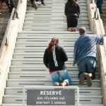 Pilgrims climb the stairs on their knees at Montreal’s St. Joseph’s Oratory. A federal politician asked if the practice would be banned under Quebec Premier François Legault’s proposal to prevent public prayer. (Michael Swan/The Catholic Register)